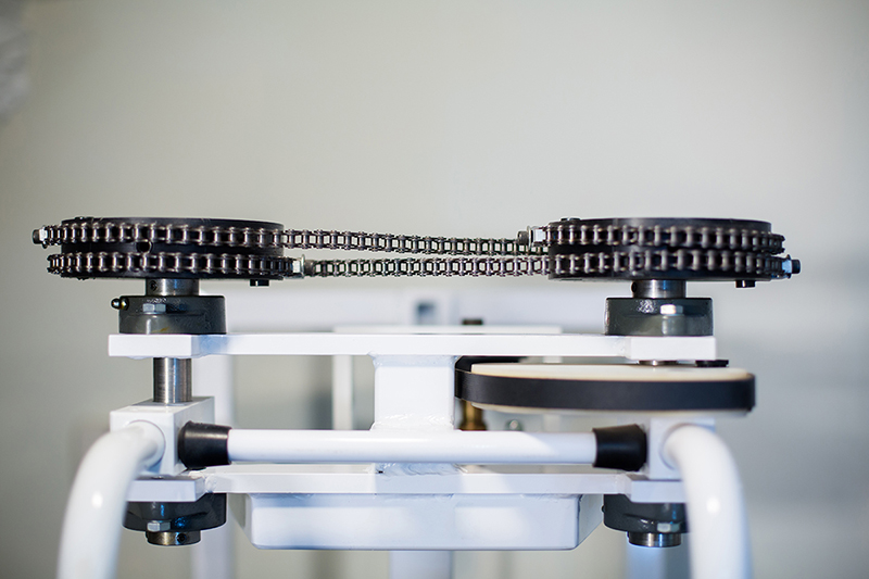 chains and pulley wheels on exercise equipment