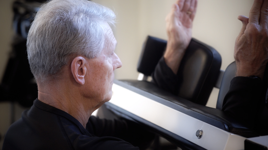 STDC man on tricep machine